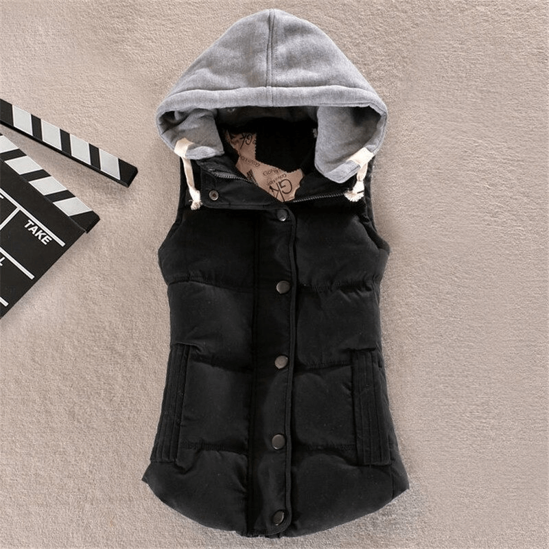 Stylish women's sleeveless hooded jacket in black with buttons and pockets, perfect for elegant casual wear. SF0023 collection.